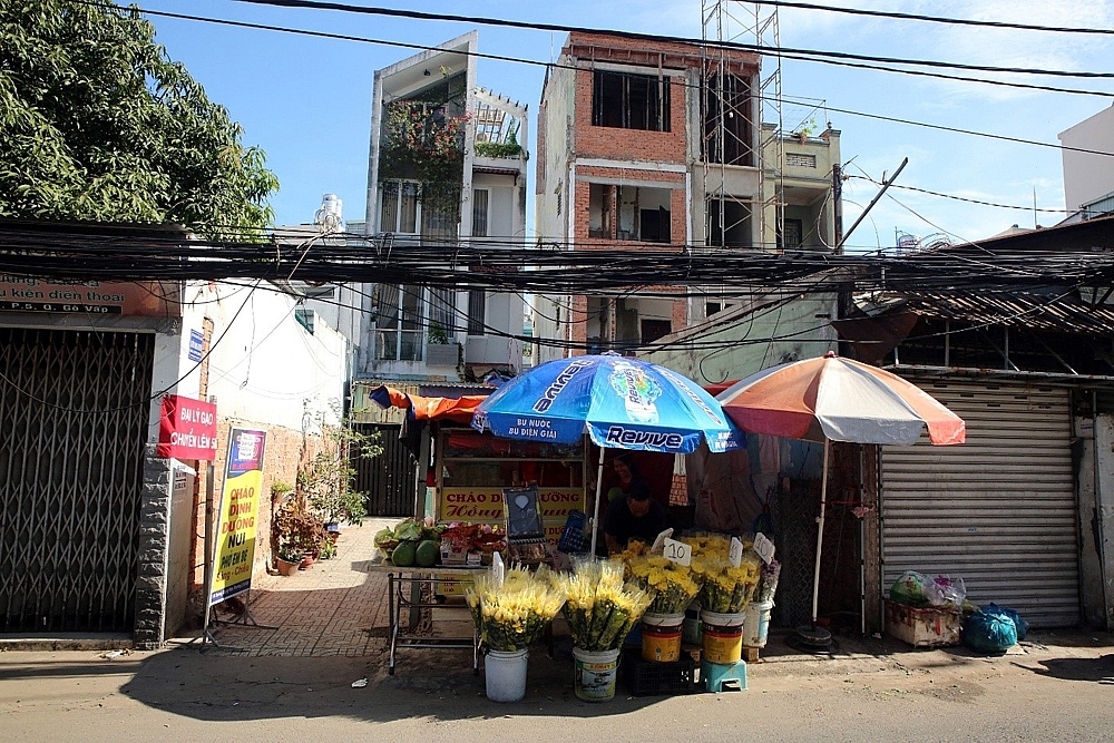 Thành phố Hồ Chí Minh: Người dân dỡ nhà, giao đất mở rộng đường Dương Quảng Hàm